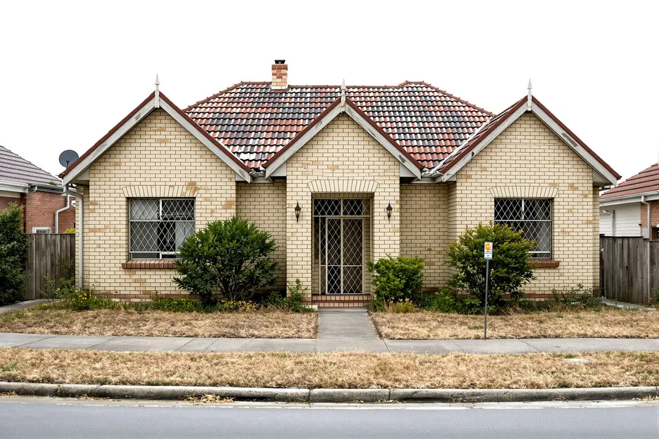 Triple-fronted to pavilion home — before